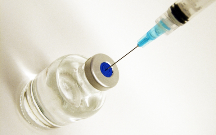 Doza vakcine i špric